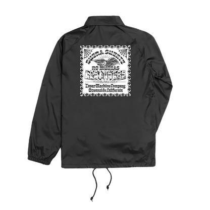 A black coach jacket shown from the back, featuring a large white graphic print on the upper back with decorative border details and text.