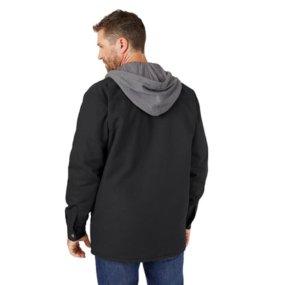 Man wearing a black jacket with a gray hood on a white background