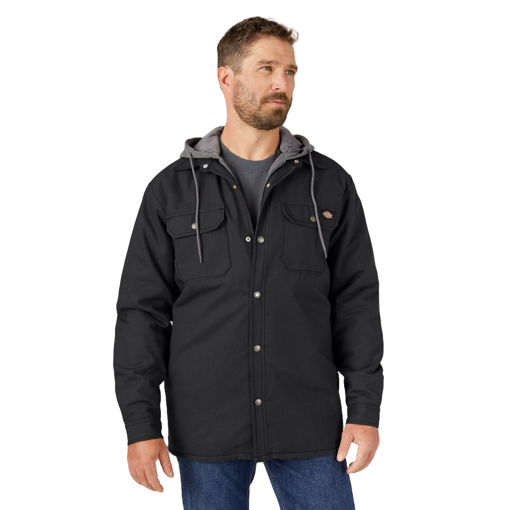 Man wearing a black jacket with a hood on a white background