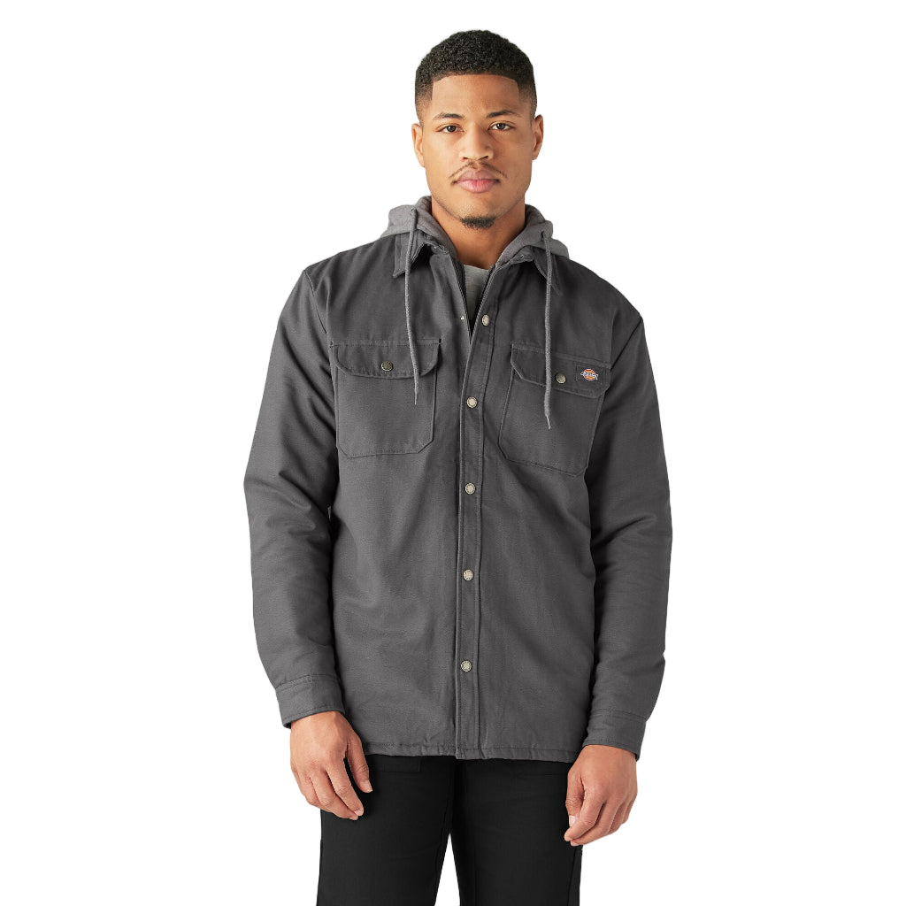 Man wearing a gray jacket on a white background