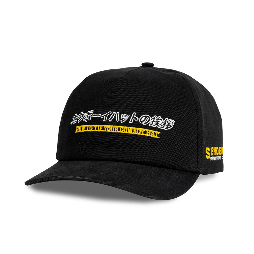 Black cap with yellow and white text on a white background