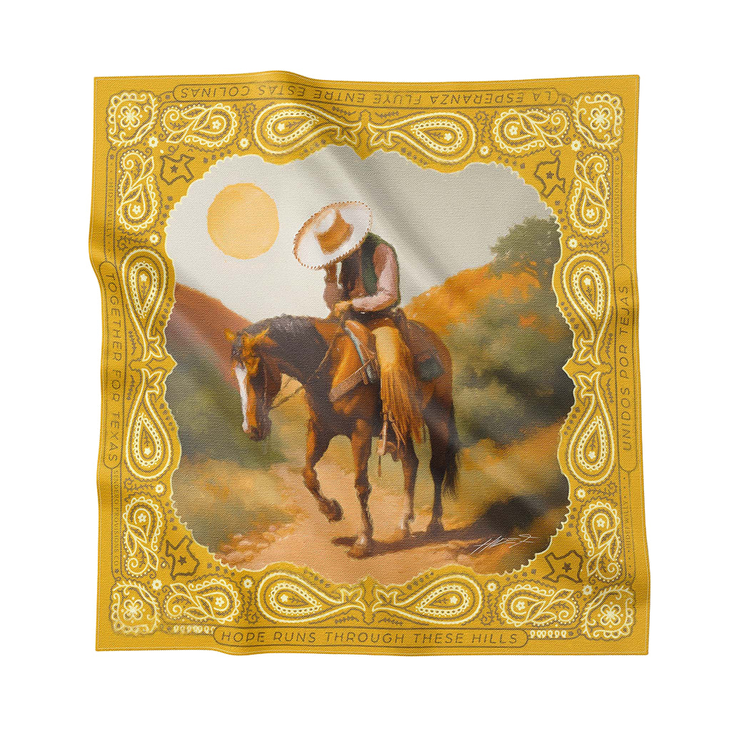 Decorative bandana with a cowboy on horseback design and decorative border.