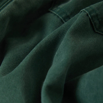 Close-up of dark green fabric texture