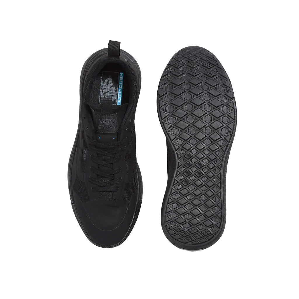 Top & Bottom of all black Vans athletic shoes 