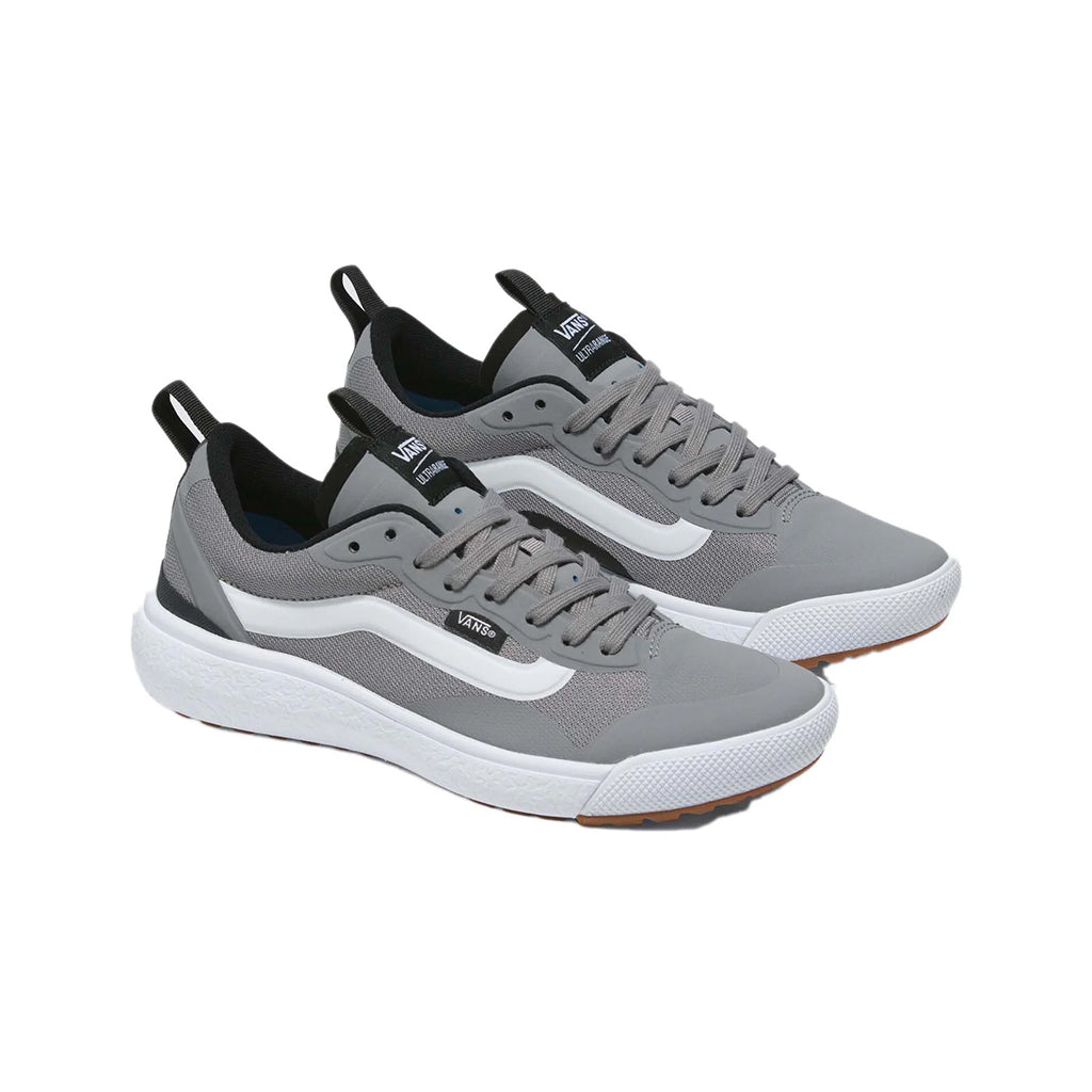 Gray sneakers with white soles on a white background