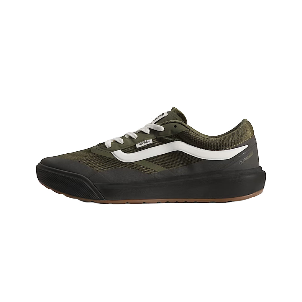 Green and black sneaker with white accents on a white background