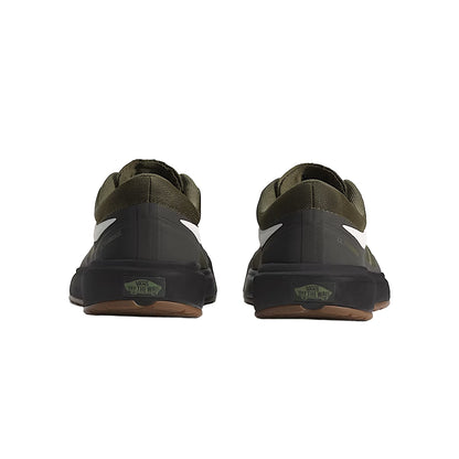 Pair of black and green shoes on a white background