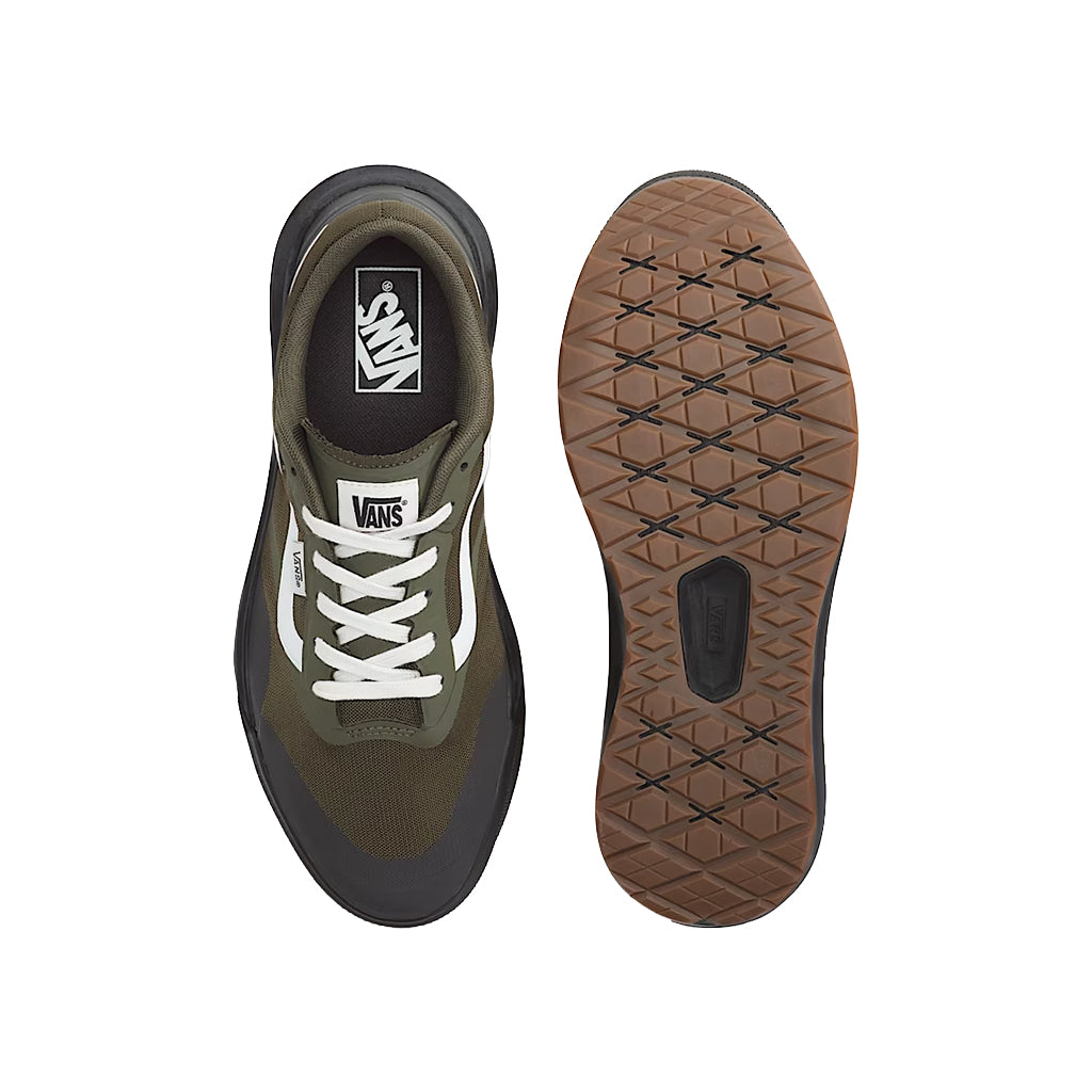 Green and black Vans sneaker with white laces on a white background