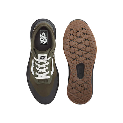Green and black Vans sneaker with white laces on a white background