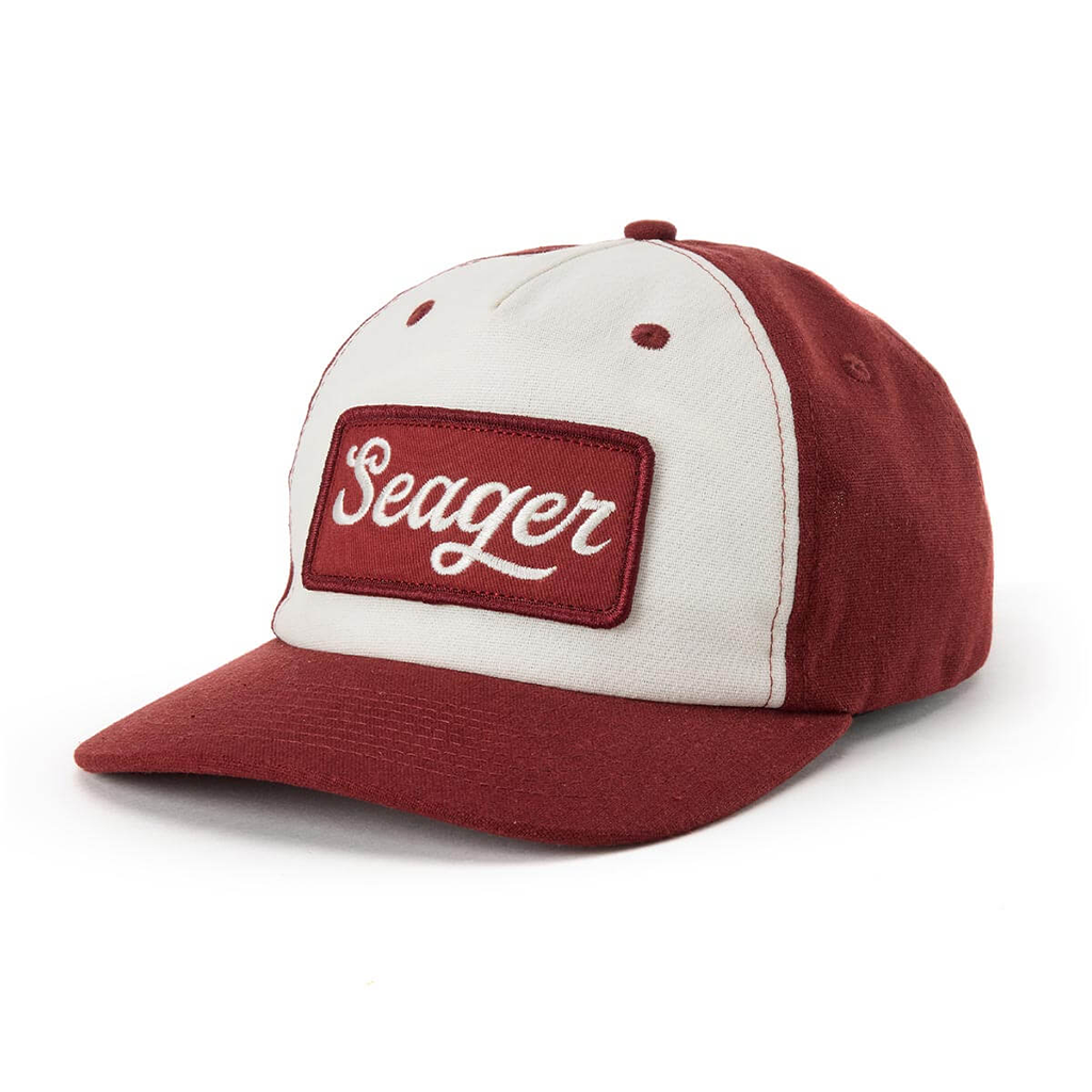 Red and white cap with 'Seager' logo on a white background