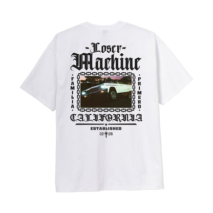 White t-shirt with black text and a photo of a limousine on the back, on a white background.
