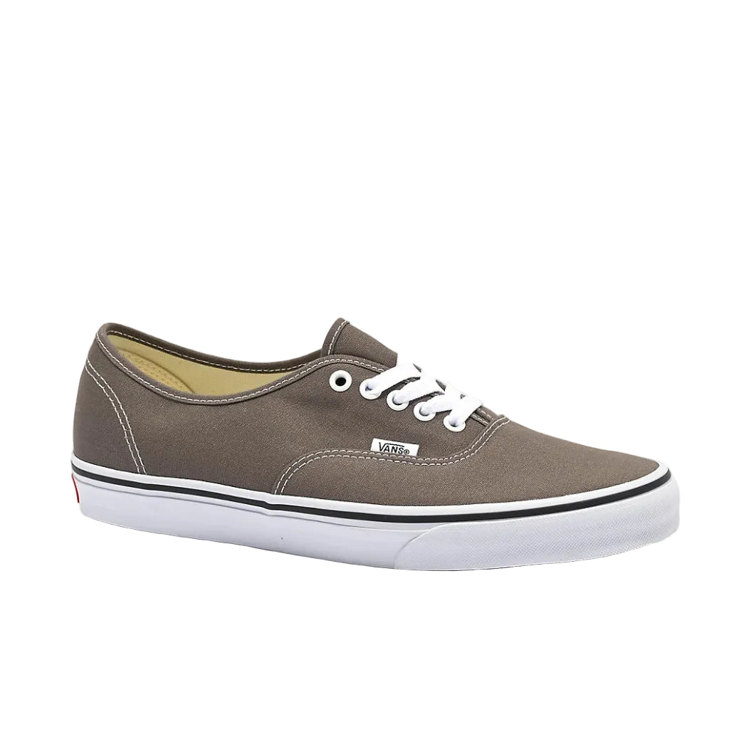 Brown sneaker with white laces on a white background