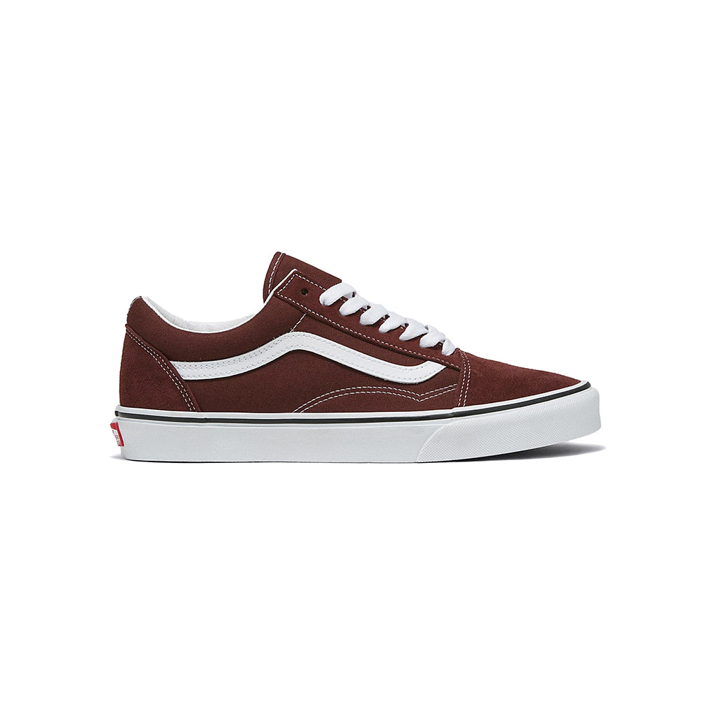 Brown sneaker with white accents on a white background