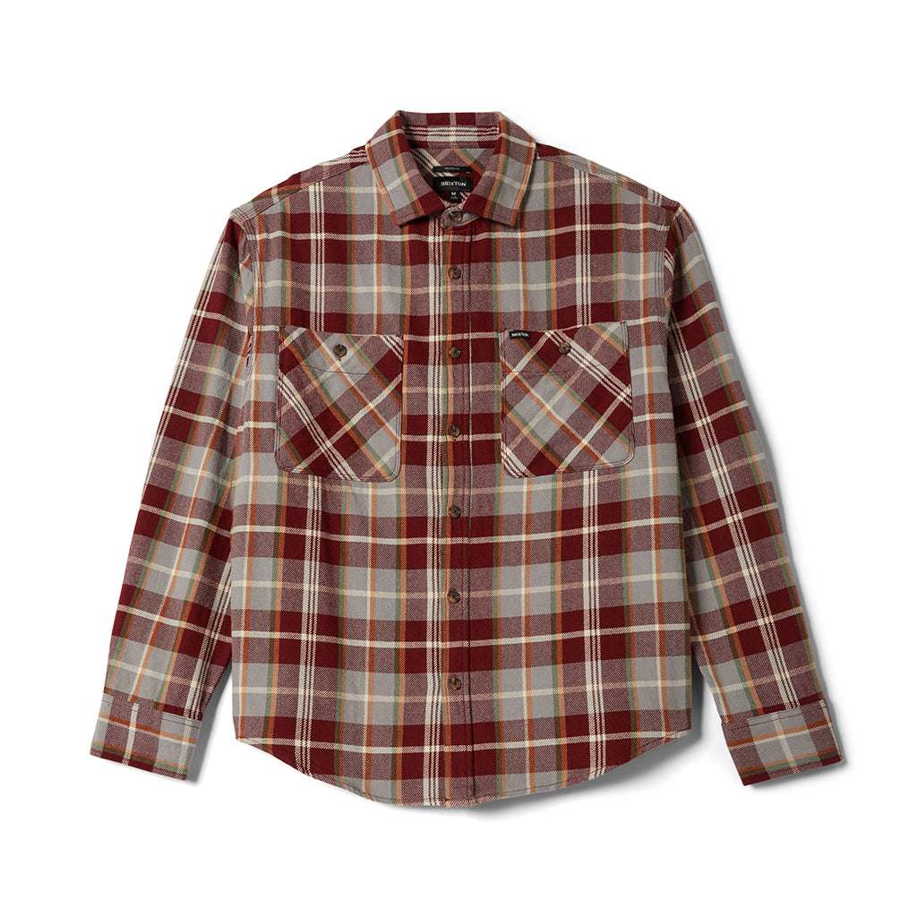 Plaid shirt with a visible brand label on a white background