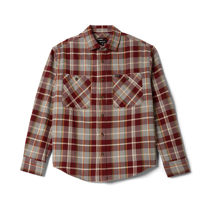 Plaid shirt with a visible brand label on a white background
