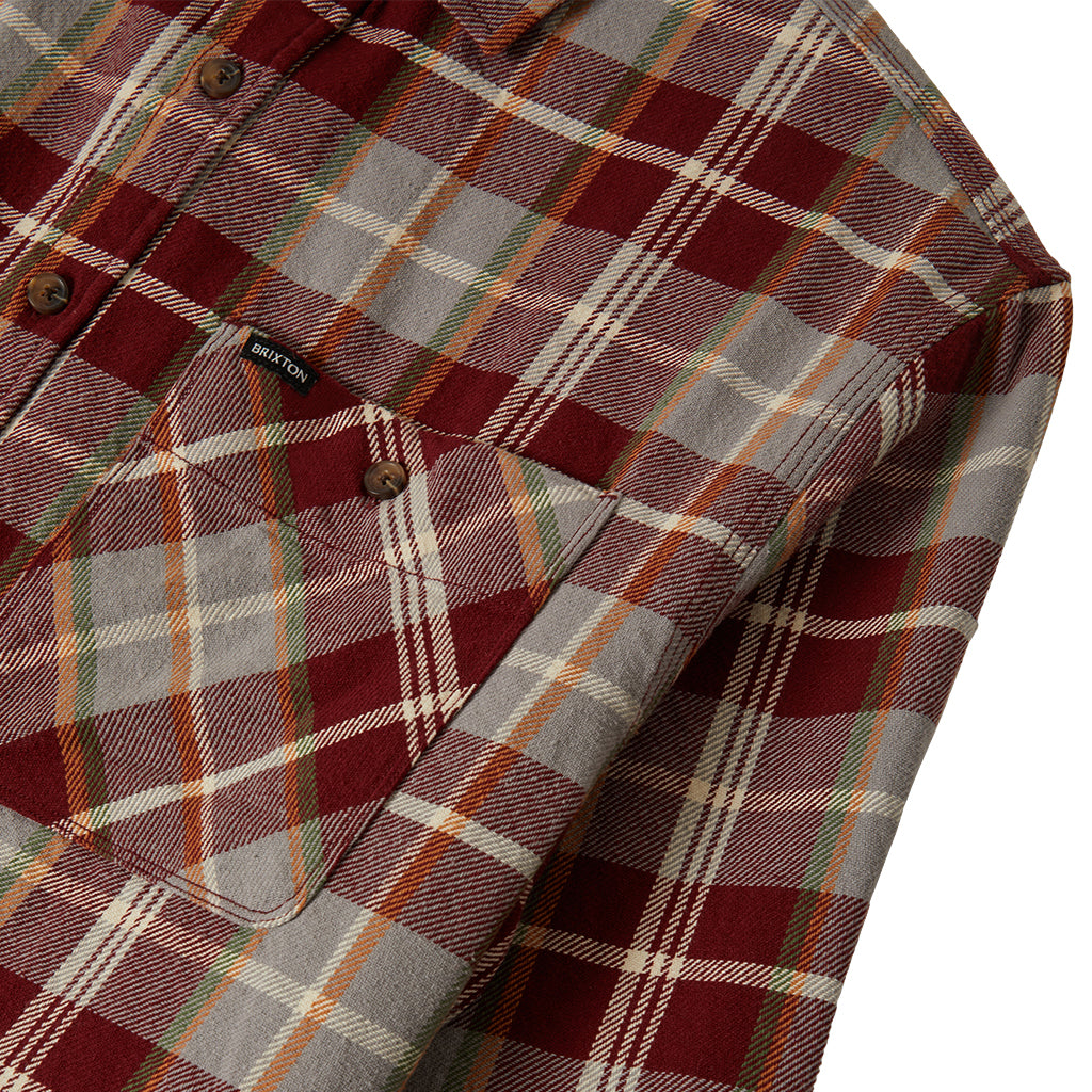 Brixton red, green, and beige flannel close up while on a white background