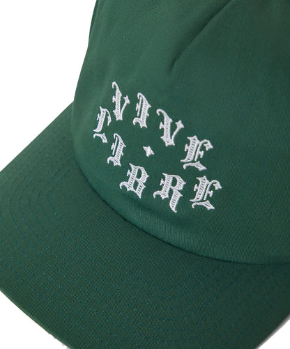 Close up of the Vive Libre on a gree trucker hat 