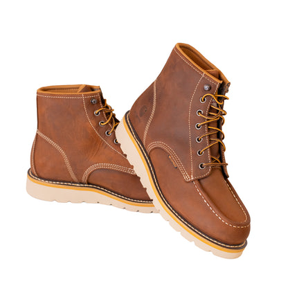 Pair of brown leather boots on a white background
