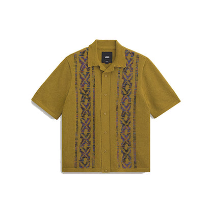 Green short-sleeve shirt with patterned details on a white background