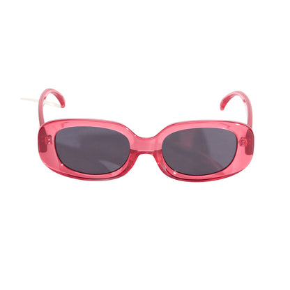 Pink sunglasses with dark lenses on a white background
