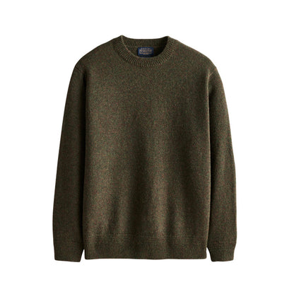 Green sweater on a white background