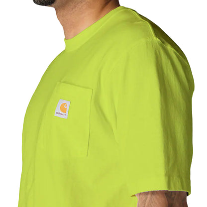 Person wearing a bright green t-shirt with a visible brand logo on a plain background