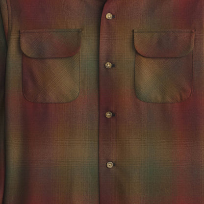 Close-up of a plaid shirt with button details