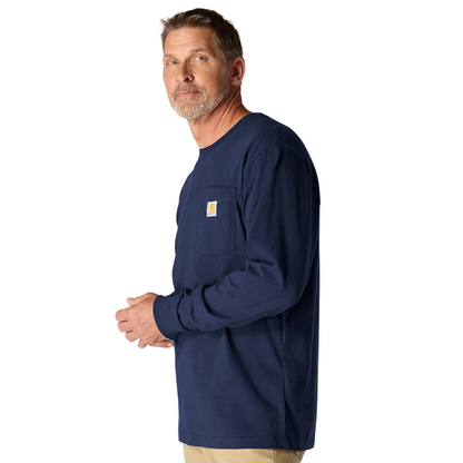 Man wearing a navy long-sleeve shirt with a brand logo on a white background