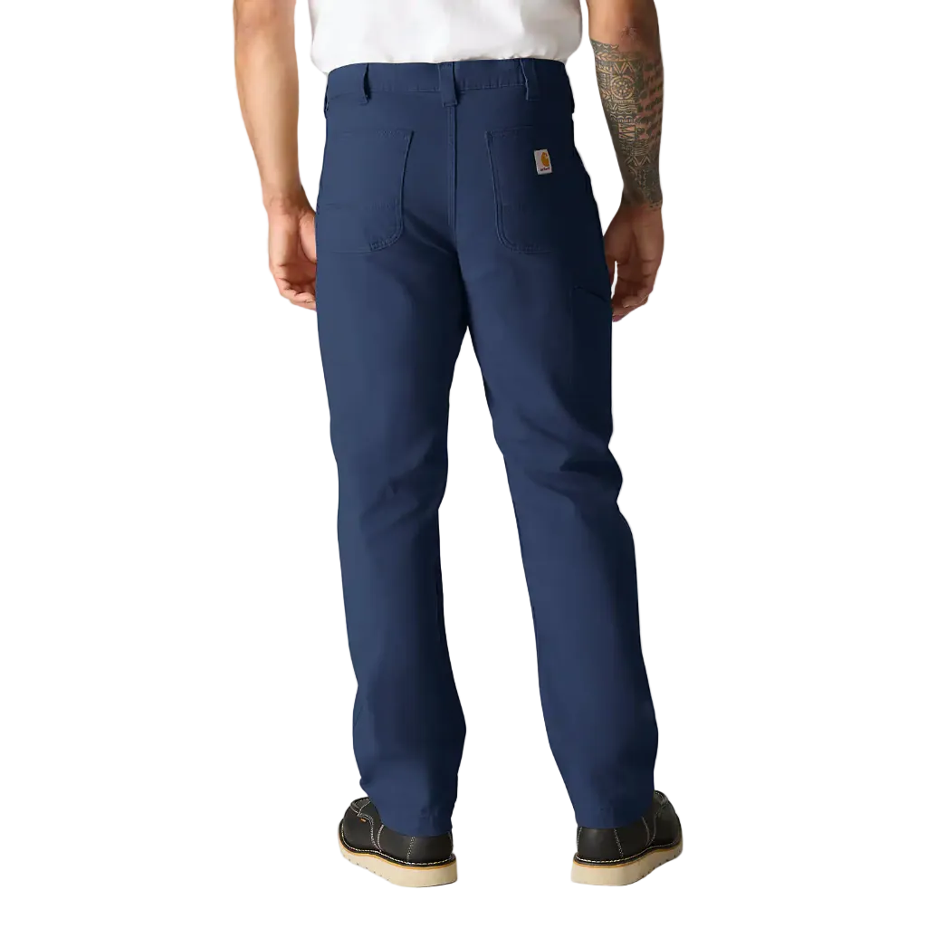 Person wearing navy blue pants on a white background