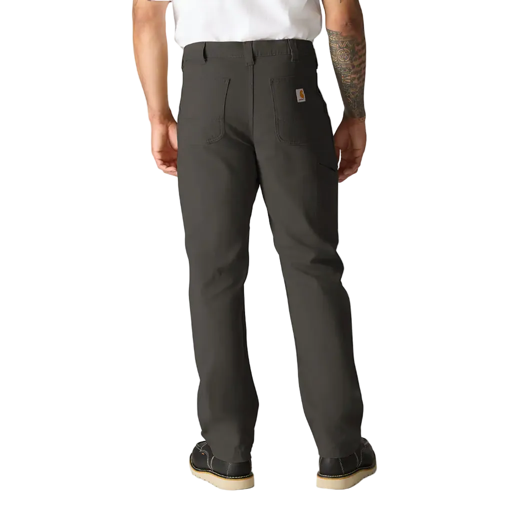 Person wearing dark gray pants on a white background