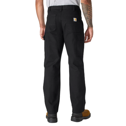 Person wearing black Carhartt pants on a white background