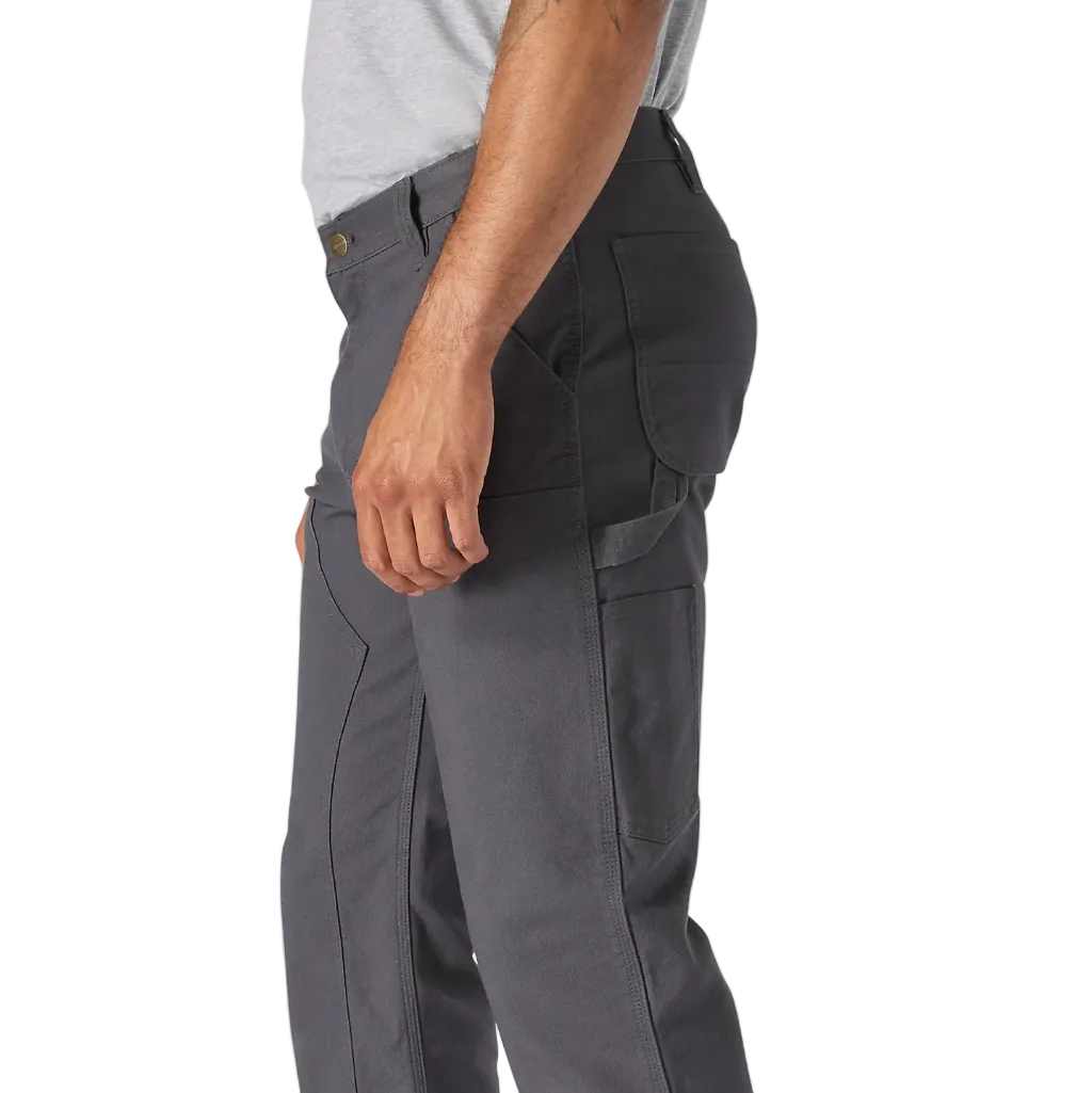 Gray pants worn by a person on a white background