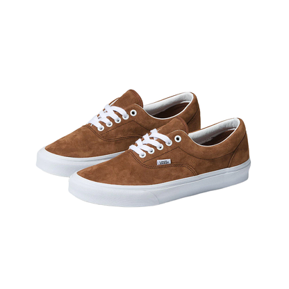 Brown sneakers with white laces on a white background