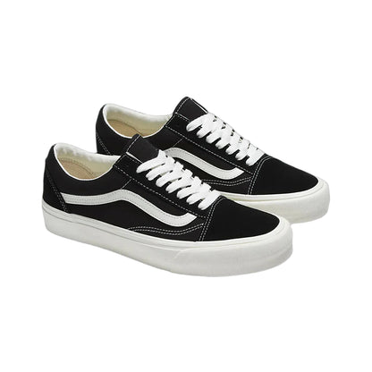 A pair of Vans Old Skool Vr3 sneakers in black and white color, featuring the brand's classic waffle outsole.