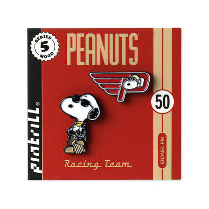 Peanuts racing team enamel pin on a red background with 'Peanuts' branding.