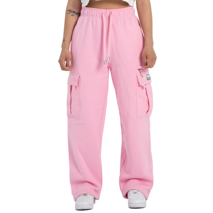 Pink cargo sweatpants with a drawstring waist and side cargo pockets, shown on a model from the waist down against a white background.