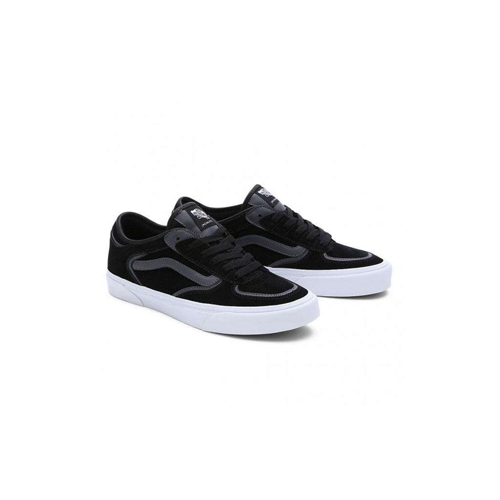 Black and white sneakers on a white background