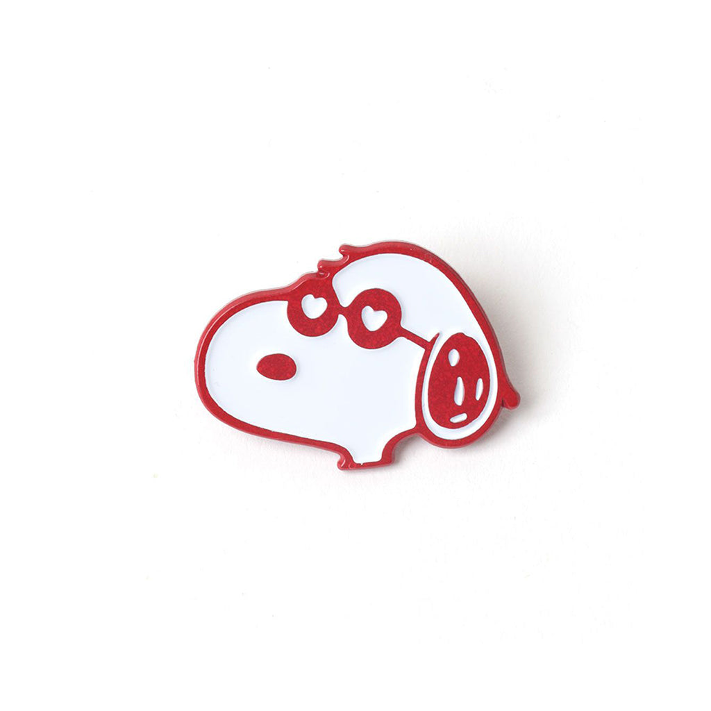Snoopy-shaped badge with red outline on a white background