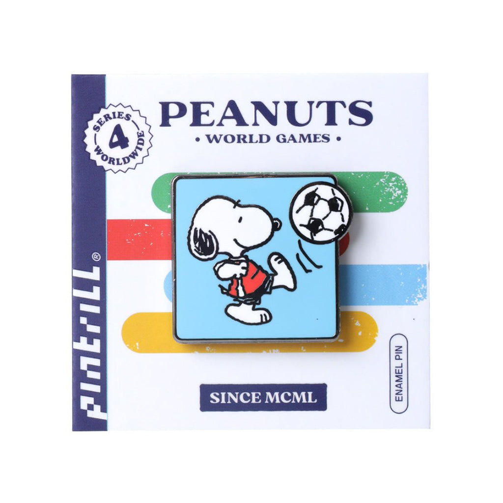 Peanuts-themed enamel pin with Snoopy playing soccer on packaging