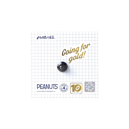 pin back on a grid background with 'Pintrill' and 'Peanuts' branding.