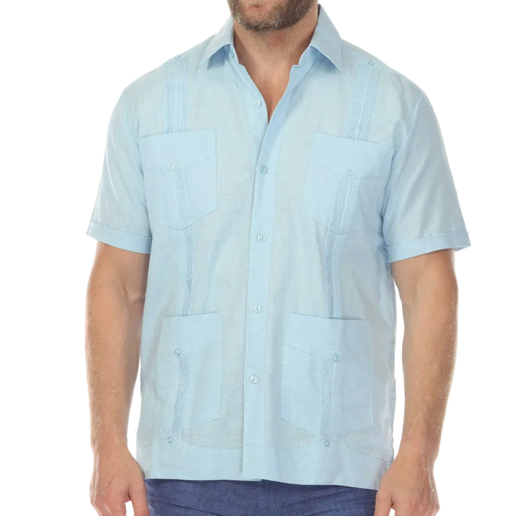 Man wearing a light blue short-sleeve shirt on a white background