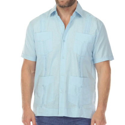 Man wearing a light blue short-sleeve shirt on a white background